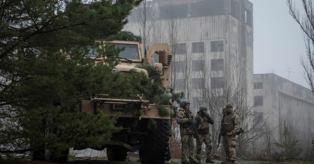 Ukrainian servicemen attend a joint drills near the border with Belarus near Chornobyl