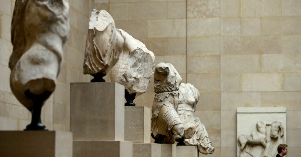A man looks at the Parthenon Marbles on show at the British Museum in London