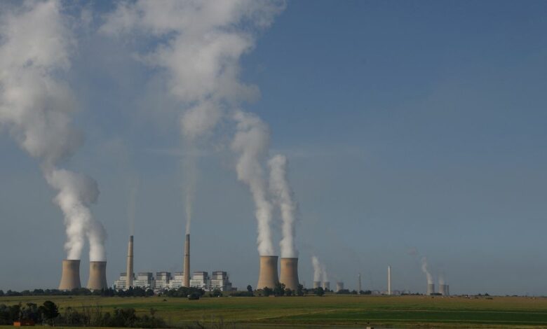 Smoke billows from the cooling towers of Kriel and Matla Power Stations in the Mpumalanga province
