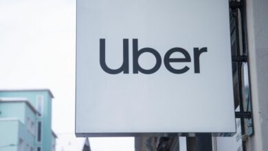Logo of Uber is seen at a temporary showroom during the World Economic Forum in Davos