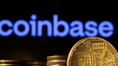 Illustration shows a representation of the cryptocurrency and Coinbase logo