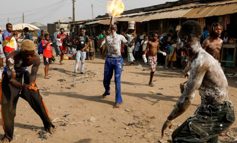Dancers perform during an annual slum party in Oworonshoki, Lagos