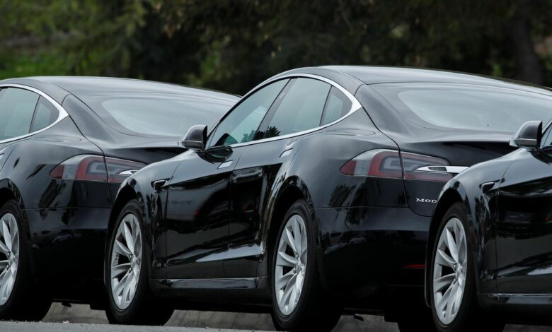 Tesla vehicles are shown at a Tesla service center in Costa Mesa, California