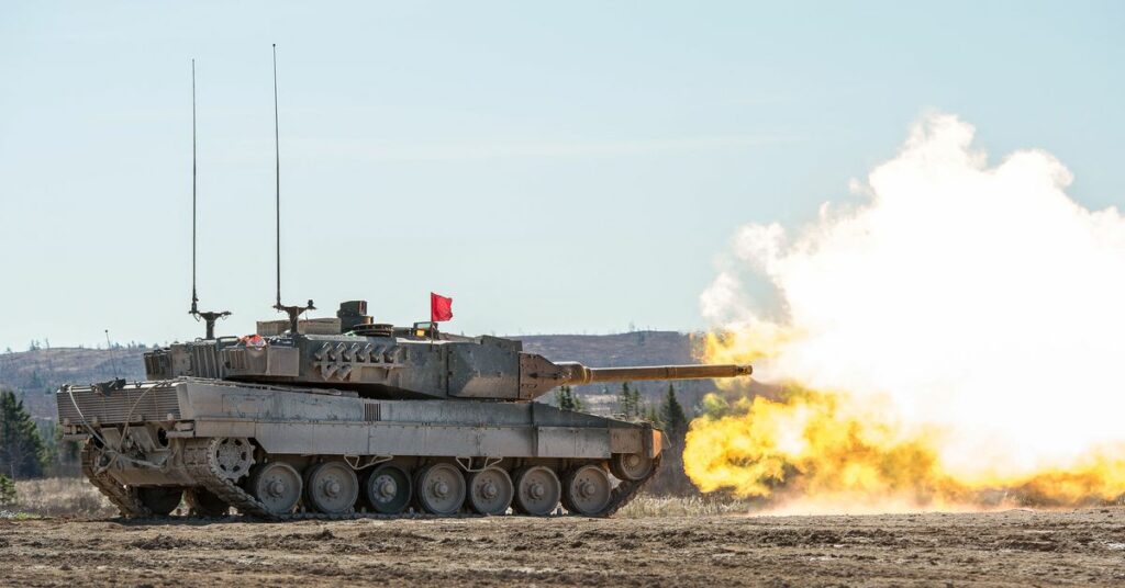 Members of the Royal Canadian Armoured Corps School (RCACS) practice their shooting skills from a Leopard II tank at firing point 4 in the training areas at the 5th Canadian Division Support Group (5 CDSG) Gagetown, in Oromocto