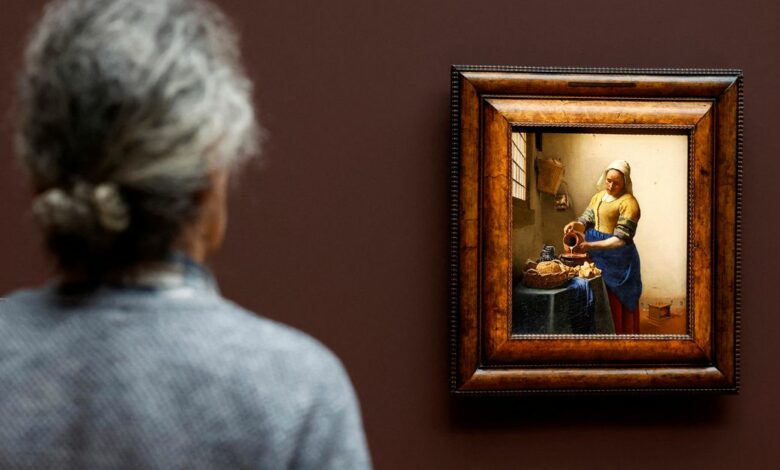 A man looks at Vermeer
