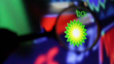 Illustration shows BP logo and stock graph