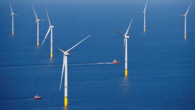 A support vessel is seen next to a wind turbine at the Walney Extension offshore wind farm operated by Orsted off the coast of Blackpool