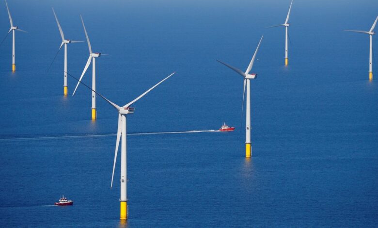 A support vessel is seen next to a wind turbine at the Walney Extension offshore wind farm operated by Orsted off the coast of Blackpool