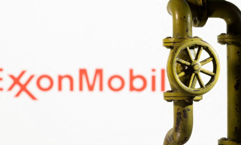 Illustration shows ExxonMobil logo and natural gas pipeline
