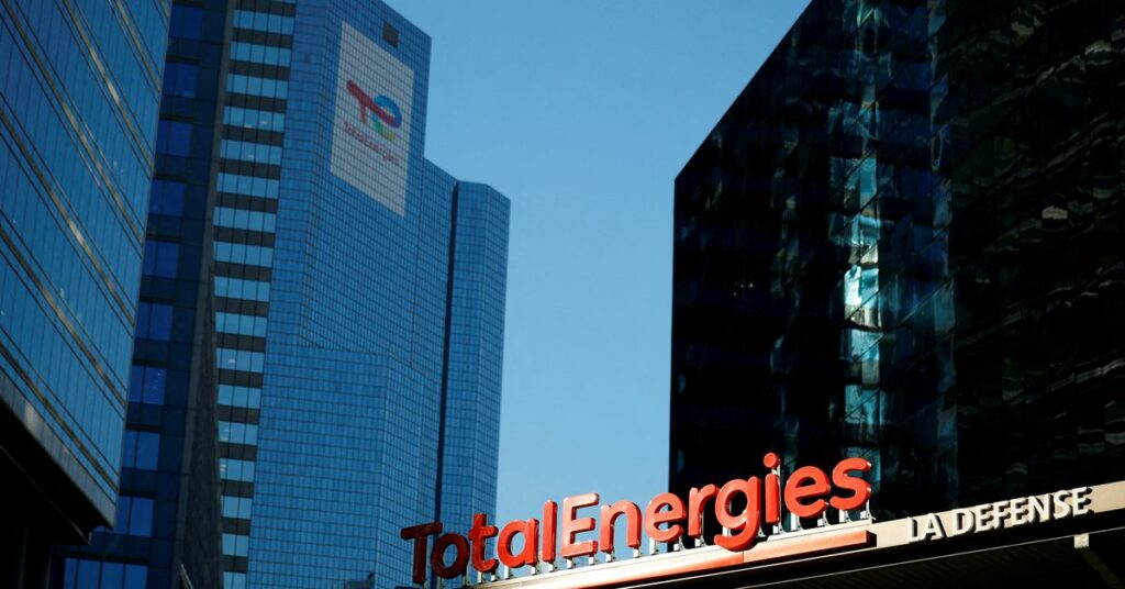 Logo of TotalEnergies at an electric vehicle fuelling station near Paris