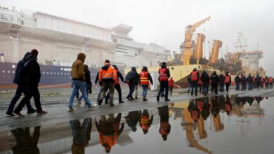 French energy workers on strike gather with dockers in the port of Saint-Nazaire