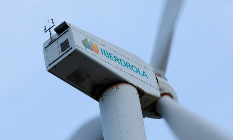 The logo of Spanish utilities company Iberdrola is displayed on wind turbines at Mt. Oiz
