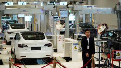 Tesla China-made Model 3 sedans are seen during a delivery event at its Shanghai factory