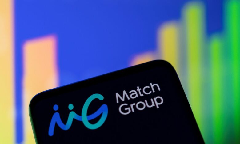 Illustration shows Match Group logo and stock graph