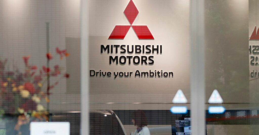 The logo of Mitsubishi Motors Corp is seen at a showroom of the company