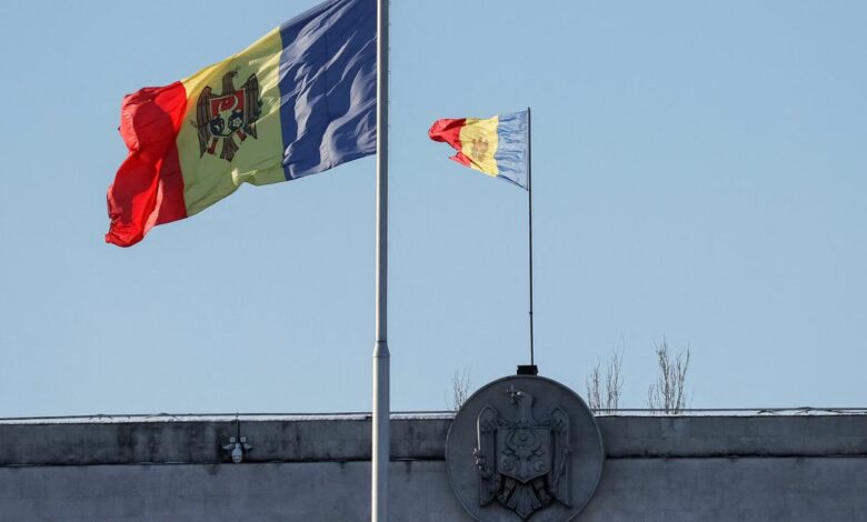 tWO Moldovan national flags are seen in central Chisinau