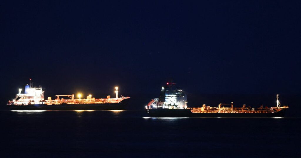 Oil product tankers sail along Nakhodka Bay near the port city of Nakhodka