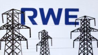 Illustration shows Electric power transmission pylon miniatures and RWE logo
