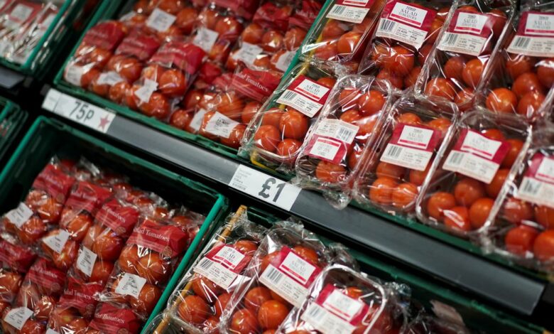 Tomatoes are displayed for sale inside a supermarket in London