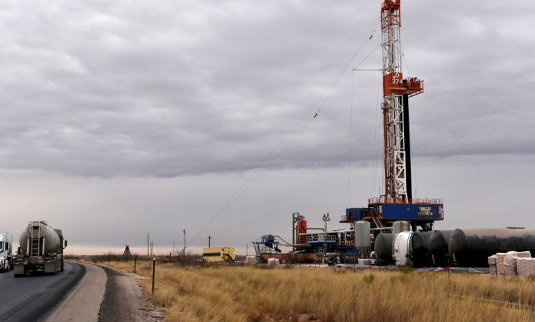 A drilling rig operates in the Permian Basin oil and natural gas producing area in Lea County