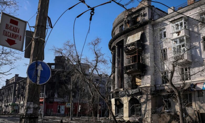 A general view shows an apartment building damaged by a Russian military strike in the frontline city of Bakhmut