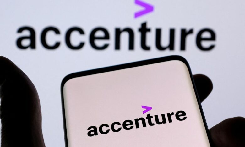 Illustration shows a smartphone with displayed Accenture PLC logo