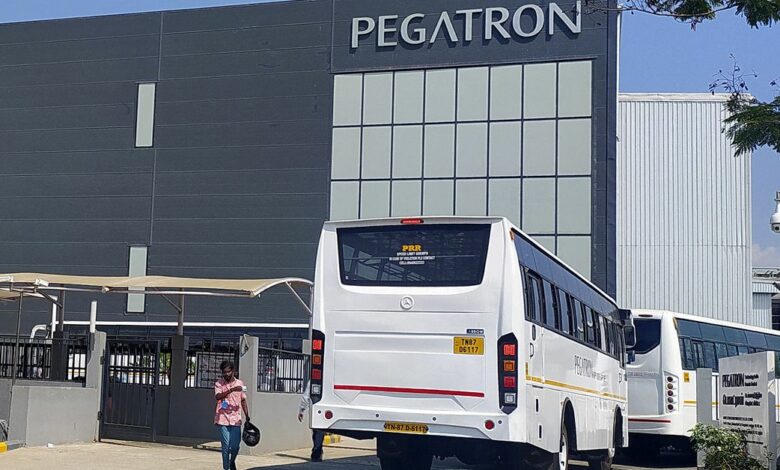 Employee buses enter the Pegatron facility near Chennai