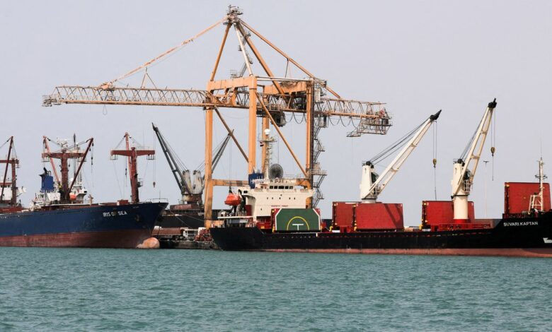 Commercial ships are docked at the Houthi-held Red Sea port of Hodeidah