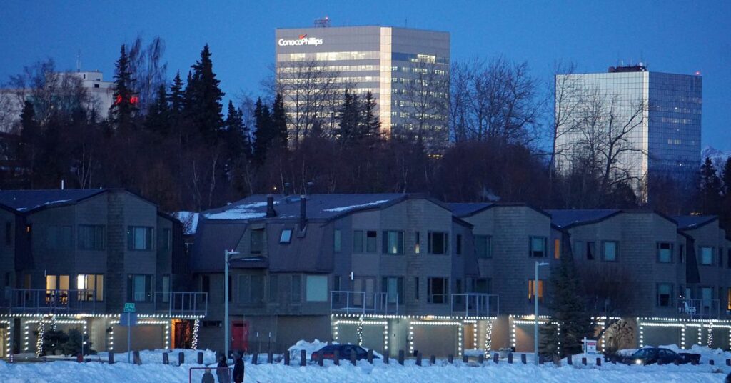 The ConocoPhillips Alaska Inc. building overlooks the frozen Westchester Lagoon in downtown Anchorage