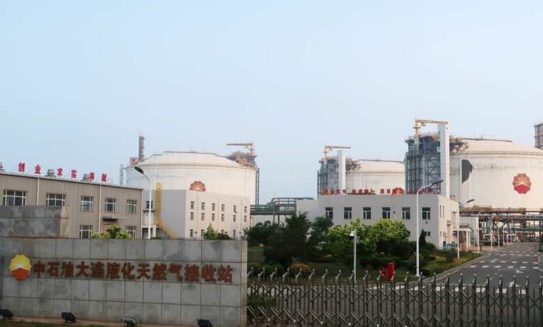 Liquified natural gas (LNG) storage tanks are seen at PetroChina's receiving terminal  in Dalian