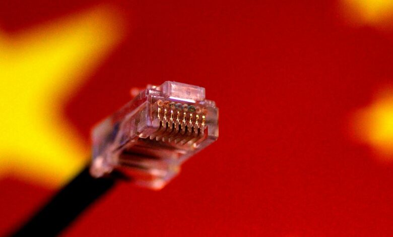 Illustration photo of a computer network cable above a Chinese flag