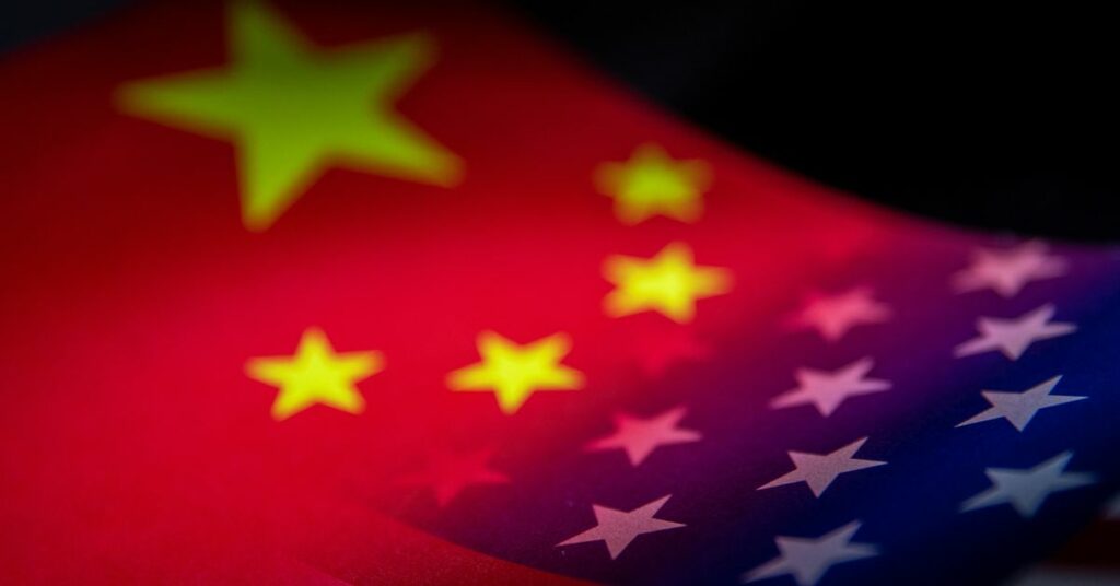 Illustration shows China's and U.S.' flags