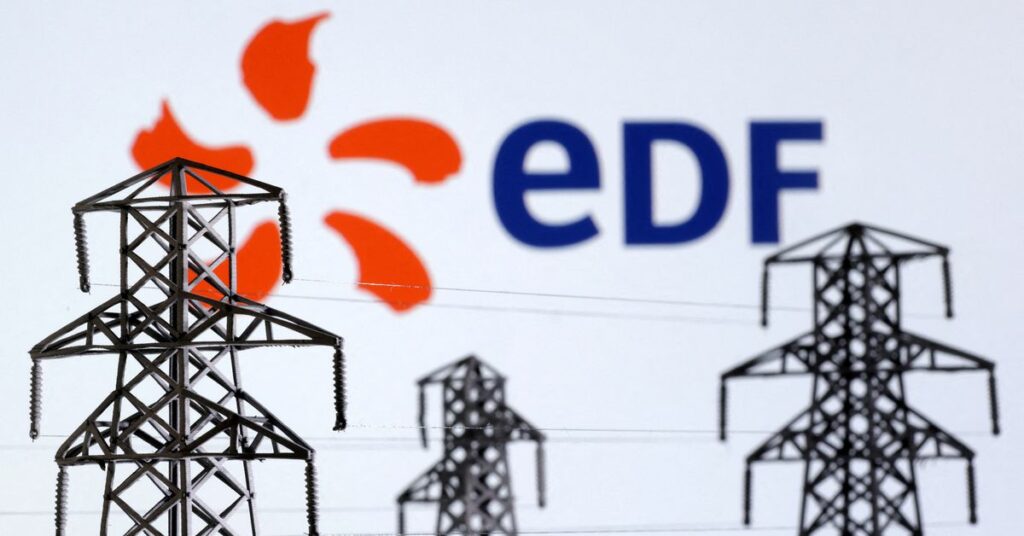 Illustration shows Electric power transmission pylon miniatures and EDF (Electricite de France) logo