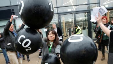 Activists protest against the carbon dioxide emissions trading in front of the World Congress Centre Bonn, the site of the COP23 U.N. Climate Change Conference, in Bonn