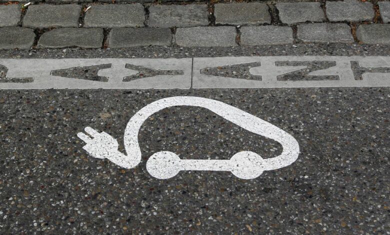 The pictogram of an electric car is painted on a parking space in Strasbourg