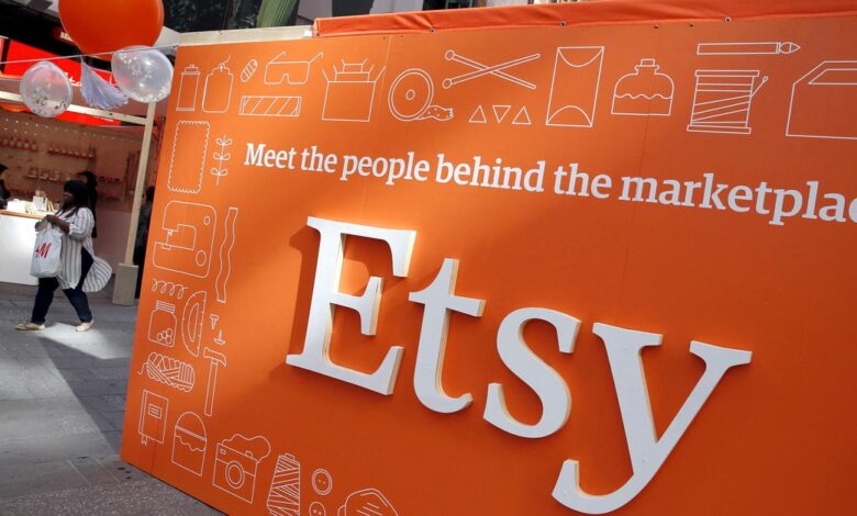 A sign advertising the online seller Etsy Inc. is seen outside the Nasdaq market site in Times Square following Etsy's IPO in New York