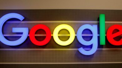 FILE PHOTO: FILE PHOTO: An illuminated Google logo is seen inside an office building in Zurich