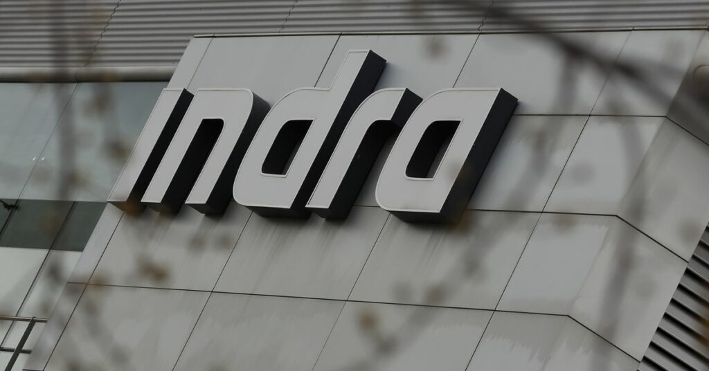 The logo of Spanish technology company Indra is seen on the top of its headquarters in Alcobendas