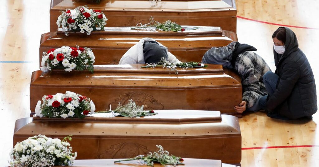 Mourners attend a lying-in-state for victims who died in a migrant shipwreck, in Crotone