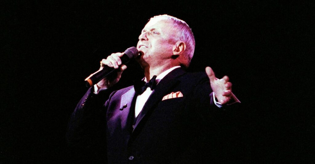 Singer Frank Sinatra performs at the Royal Albert Hall in London