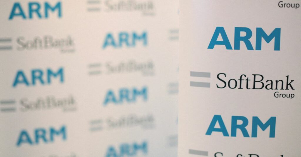 An ARM and SoftBank Group branded board is displayed at a news conference in London