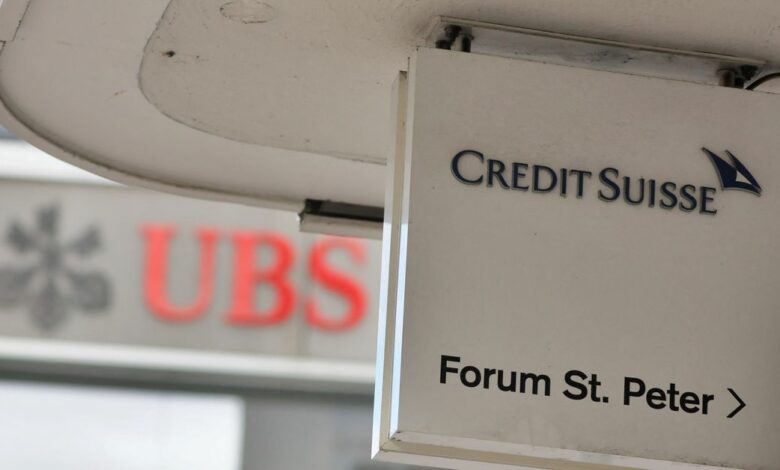 Logos of Swiss bank UBS and Credit Suisse in Zurich