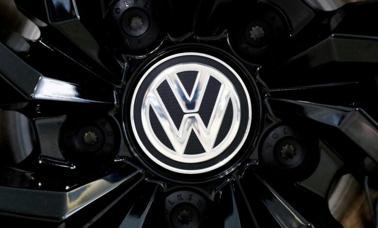 The logo of German carmaker Volkswagen is seen on a rim cap in a showroom of a Volkswagen car dealer in Brussels