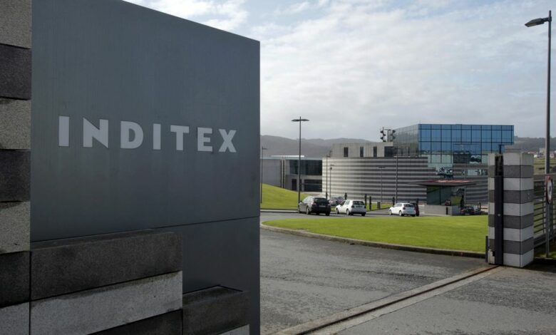 An Inditex logo is seen at the entrance of a Zara factory, the headquarters of Inditex group, in Arteixo