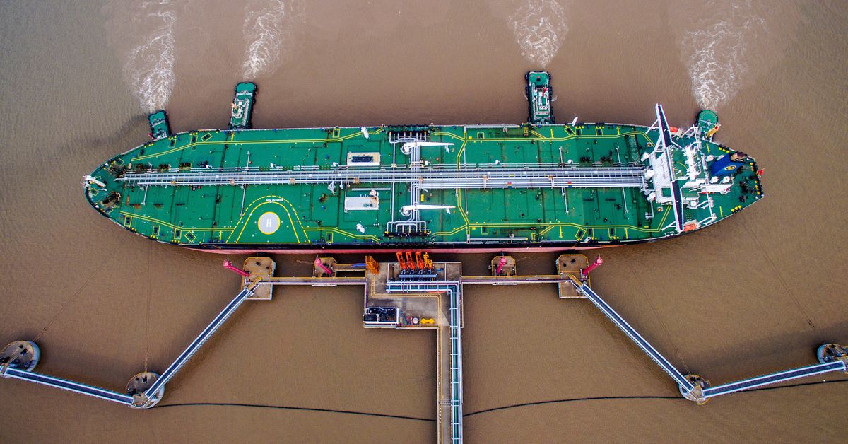 Oil tanker unloads crude oil at a crude oil terminal in Zhoushan