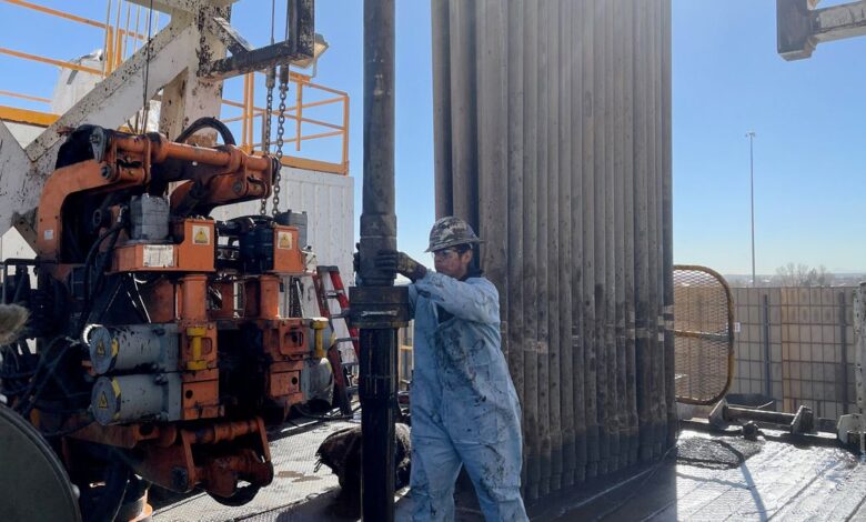 A rig hand works on an electric drilling rig for oil producer Civitas Resources, at the Denver suburbs, in Broomfield