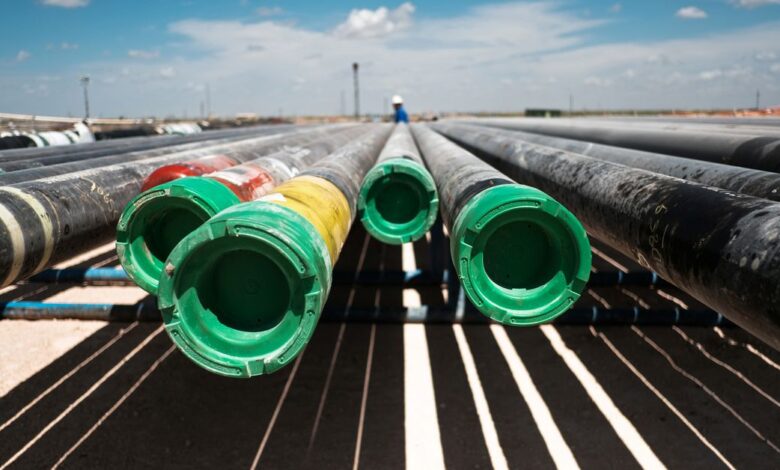 Pipes are seen at a Chevron oil exploration drilling site near Midland