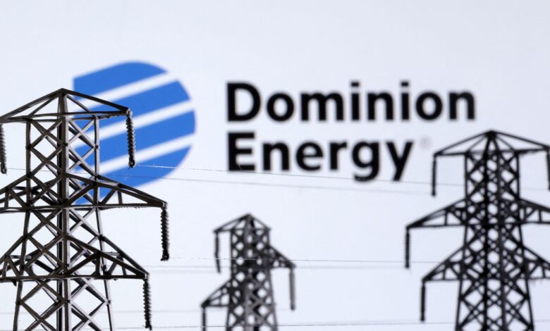 Illustration shows Electric power transmission pylon miniatures and Dominion Energy logo