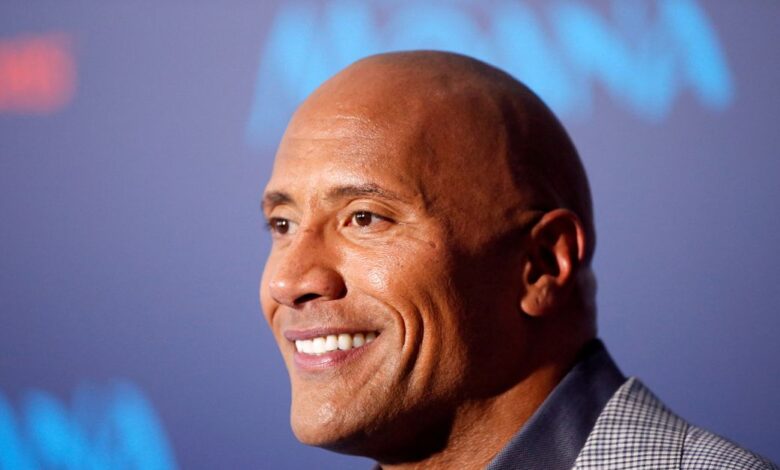 Actor Dwayne Johnson poses at the world premiere of Walt Disney Animation Studios' "Moana" as a part of AFI Fest in Hollywood