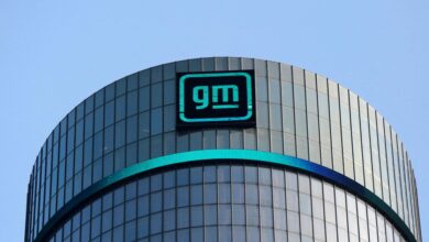 Logo of GM atop the company headquarters